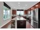 Modern kitchen featuring stainless steel appliances, ample counter space, and sleek finishes at 5163 Nettleton Way, Avon, IN 46123