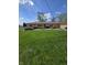 Large backyard with a shed, patio furniture and well-maintained lawn at 5218 Fletcher St, Anderson, IN 46013