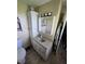 Bathroom with vanity, mirror, cabinet, and toilet at 5218 Fletcher St, Anderson, IN 46013