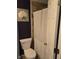 Bathroom featuring a toilet, shower with curtain and decorative wall art at 5218 Fletcher St, Anderson, IN 46013