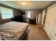Comfortable bedroom with carpet floors, and large closet at 5218 Fletcher St, Anderson, IN 46013