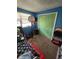 Unique bedroom with themed decor, basketball hoop, and lots of natural light at 5218 Fletcher St, Anderson, IN 46013