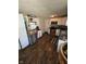 Efficient kitchen with modern appliances, ample countertop space, and wooden floors at 5218 Fletcher St, Anderson, IN 46013