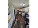 Well-lit kitchen with white cabinets, modern appliances, and dark countertops at 5218 Fletcher St, Anderson, IN 46013