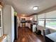 Charming kitchen featuring stainless steel appliances and hardwood floors at 5218 Fletcher St, Anderson, IN 46013