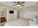 Spacious bedroom showing attached bathroom, large closet and neutral color scheme at 5255 Apache Moon, Carmel, IN 46033