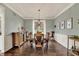 Formal dining room with chandelier, hardwood floors and buffet at 5255 Apache Moon, Carmel, IN 46033