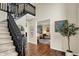 Spacious entryway features a staircase, hardwood floors and access to multiple rooms at 5255 Apache Moon, Carmel, IN 46033