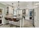 Modern kitchen featuring stainless steel appliances, quartz countertops and a center island with seating at 5255 Apache Moon, Carmel, IN 46033
