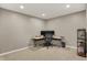 Home office featuring a minimalist design, ample lighting, and a functional workspace at 5255 Apache Moon, Carmel, IN 46033