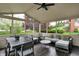 Lovely screened porch features multiple seating options and natural light at 5255 Apache Moon, Carmel, IN 46033