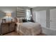 Neutral-toned bedroom with closet, window, and stylish furnishings creating a cozy and inviting space at 5291 Nettleton Way, Avon, IN 46123