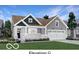 Charming single-Gathering home with white brick accents, gray siding, and a well-manicured lawn at 5291 Nettleton Way, Avon, IN 46123