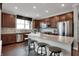 Beautiful kitchen featuring stainless steel appliances and a granite countertop island with barstools at 5291 Nettleton Way, Avon, IN 46123