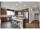 Spacious kitchen with stainless steel appliances, granite countertops, and modern barstools at 5291 Nettleton Way, Avon, IN 46123