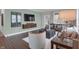 Cozy living room with comfortable seating, accent wall, and modern decor at 5291 Nettleton Way, Avon, IN 46123