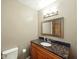 Bathroom with granite countertop, vanity and mirror at 5305 N Cork Dr, Muncie, IN 47304