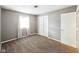 Bedroom featuring neutral walls, carpet flooring, closet and bright window at 5305 N Cork Dr, Muncie, IN 47304