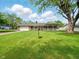 Ranch home with a covered front porch and a well-manicured lawn at 5305 N Cork Dr, Muncie, IN 47304