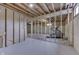 Unfinished basement showing framing and exercise equipment at 5499 Steven Dr, Greenwood, IN 46142