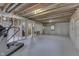 Unfinished basement with exposed framing, and fitness equipment at 5499 Steven Dr, Greenwood, IN 46142