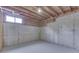 Unfinished basement with exposed wood ceiling and concrete walls at 5499 Steven Dr, Greenwood, IN 46142