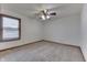 Neutral bedroom with carpet floors and a window providing natural light at 5499 Steven Dr, Greenwood, IN 46142