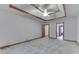 Spacious bedroom with a decorative ceiling and ample natural light from the window at 5499 Steven Dr, Greenwood, IN 46142