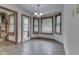 Charming breakfast nook with bay windows and tiled flooring, perfect for morning coffee at 5499 Steven Dr, Greenwood, IN 46142