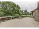 View from the deck overlooking the backyard and lush greenery at 5499 Steven Dr, Greenwood, IN 46142