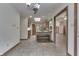 Bright kitchen area with a skylight and tiled floors at 5499 Steven Dr, Greenwood, IN 46142