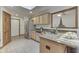 Modern kitchen with stainless steel appliances, granite countertops, and tiled flooring at 5499 Steven Dr, Greenwood, IN 46142