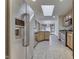 Spacious kitchen with stainless steel appliances, granite countertops, and bright skylight at 5499 Steven Dr, Greenwood, IN 46142