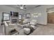 Bright living room with a cozy fireplace, vaulted ceilings, and stylish furnishings at 5499 Steven Dr, Greenwood, IN 46142