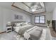 Comfortable main bedroom featuring plush carpet, a ceiling fan, and neutral decor at 5499 Steven Dr, Greenwood, IN 46142