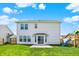 View of the backyard featuring a well-maintained lawn, playground, privacy fence, and patio at 5518 Wood Spring Ln, McCordsville, IN 46055