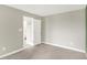 Bedroom with fresh paint, carpet flooring, and views of an adjacent room with a bathroom at 5518 Wood Spring Ln, McCordsville, IN 46055