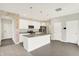 Modern kitchen with granite countertops, stainless steel appliances, and a center island at 5518 Wood Spring Ln, McCordsville, IN 46055
