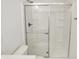 Modern bathroom featuring a shower with sleek sliding glass doors, easy to keep clean at 5518 Wood Spring Ln, McCordsville, IN 46055