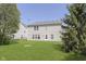 Spacious backyard with a well-maintained lawn, perfect for outdoor activities and relaxation at 5646 Skipping Stone Dr, Indianapolis, IN 46237
