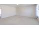 Bright bedroom with plush carpeting and a well-lit window at 5646 Skipping Stone Dr, Indianapolis, IN 46237