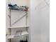 White closet with shelves to organize pillows, sheets and clothing at 5646 Skipping Stone Dr, Indianapolis, IN 46237