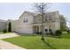 Charming two-story home featuring a two-car garage and well-maintained front lawn at 5646 Skipping Stone Dr, Indianapolis, IN 46237