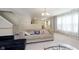Spacious living room featuring plush sofas, neutral walls, and a carpeted floor at 5646 Skipping Stone Dr, Indianapolis, IN 46237