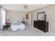 Main bedroom featuring neutral colors and a ceiling fan at 5646 Skipping Stone Dr, Indianapolis, IN 46237