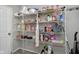 Pantry features an organized array of shelving for ample storage at 5646 Skipping Stone Dr, Indianapolis, IN 46237