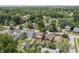An aerial shot showing a lovely neighborhood, full of mature trees, and well-kept homes at 6051 Lowell Ave, Indianapolis, IN 46219
