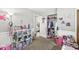 This room features a closet and decor, creating a playful and functional space at 617 Grovewood Dr, Beech Grove, IN 46107