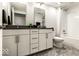 Modern bathroom featuring double sink vanity, sleek fixtures, and a clean, contemporary design at 622 E 10Th St # 212, Indianapolis, IN 46202