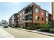 A contemporary apartment building with mixed-material facade and multiple balconies at 622 E 10Th St # 212, Indianapolis, IN 46202